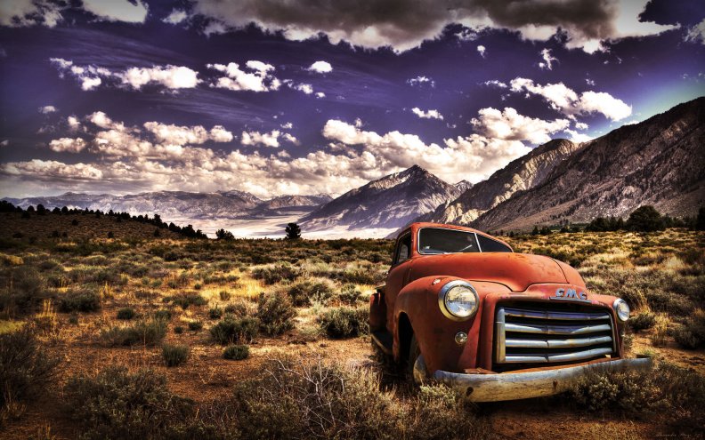 a_rusted_gmc_pickup_abandoned_in_a_desert_hdr.jpg