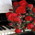 Bouquet of red roses and  music