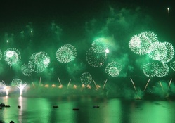 beautiful green fireworks in a harbor