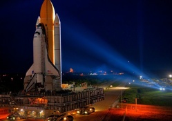 the shuttle discovery moving to launch pad