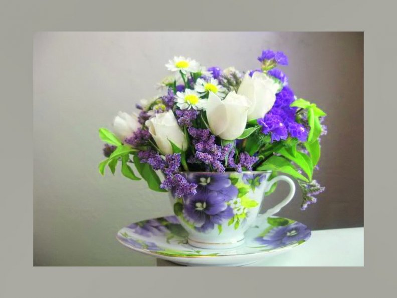 A cup of May flowers