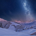 wonderful starry night above a town in a valley