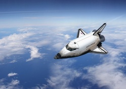 Shuttle flying over the Earth