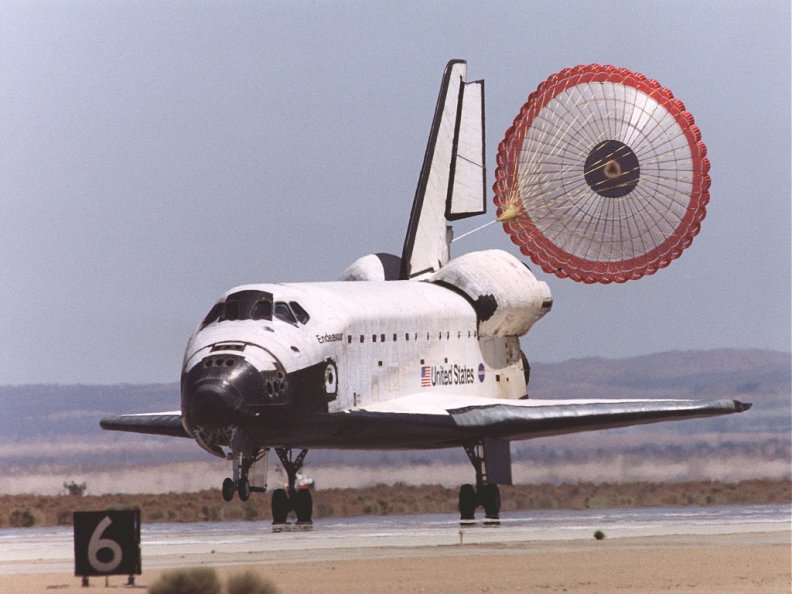 Space Shuttle Landing with Parachute