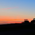 Farm Tractors in the Sunrise