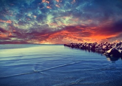 Sunset over a Rocky Beach