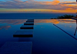 infinity pool on oahu hawaii at sunset
