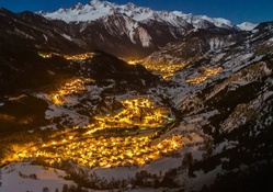 fantastic mountain winter resort town at dusk