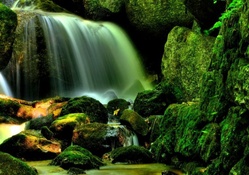 moss covered green waterfall hdr