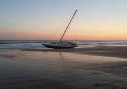 Lonely Sailboat on a Uruguay Beach