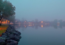 autumn evening on a foggy lake