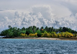 wonderful clouds above a tropical island hdr