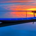 A loveiy boat at sunset river