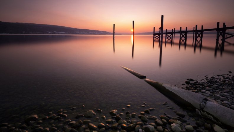 lake pier at sunset