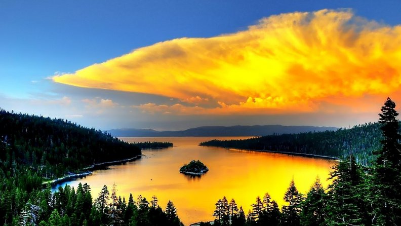 golden_clouds_over_lake_landscape.jpg