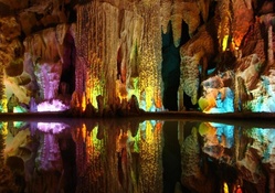 colored lights reflected inside a beautiful cave