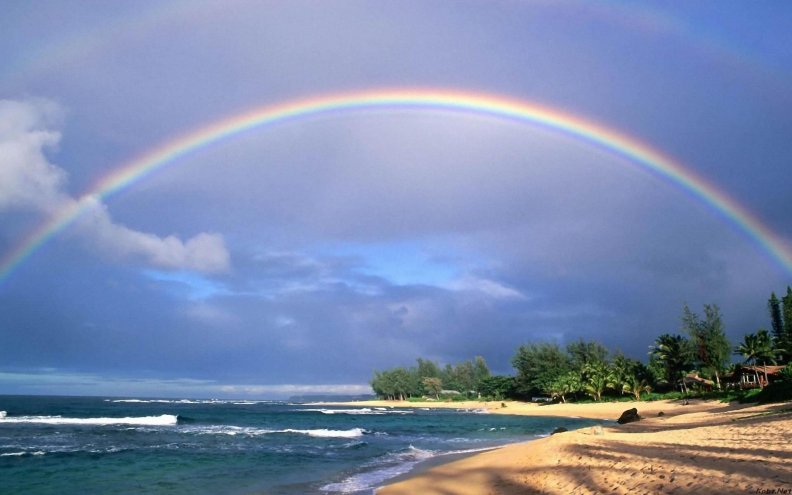 rainbow above a beach
