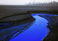 blue creek in a lava field