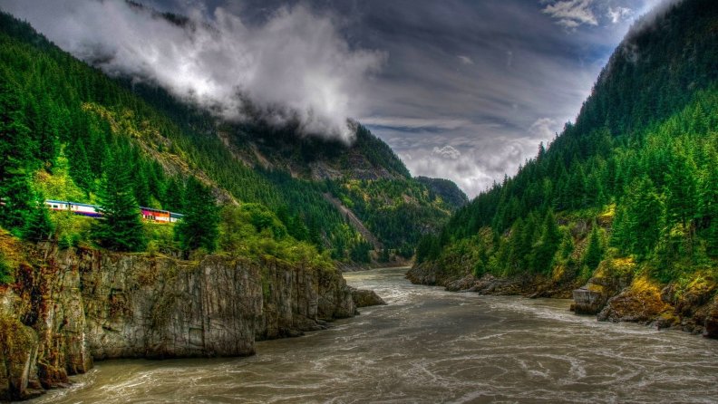 train_travel_in_a_wondrous_river_gorge_hdr.jpg