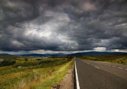 road under overcast sky