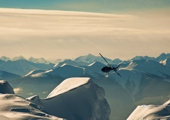 Helicopter Over Mountains by Neal Rogers