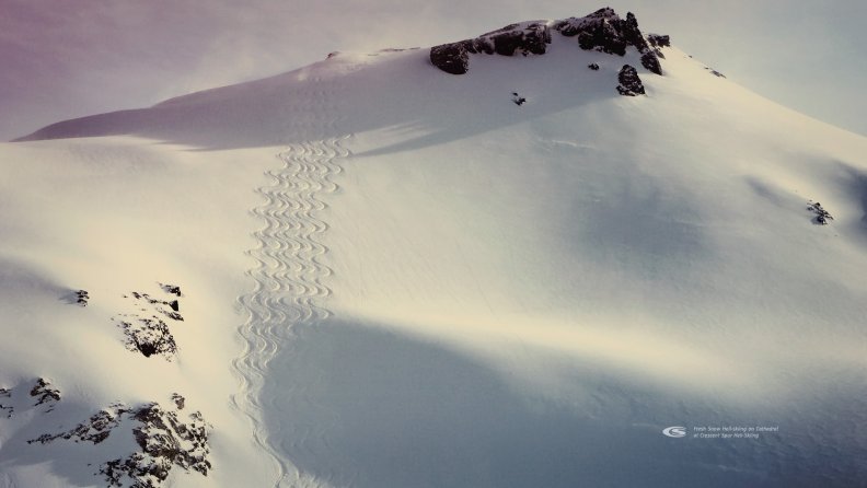 fresh_tracks_on_cathedral_at_crescent_spur_heli_skiing.jpg
