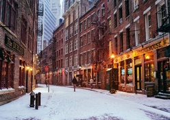 stone street in downtown manhatten in winter