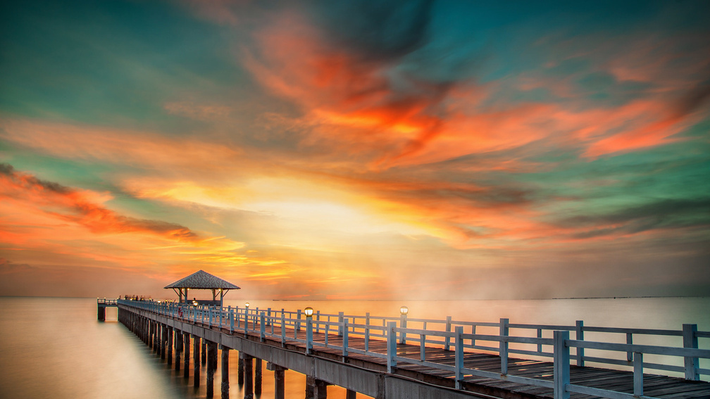 fabulous colored sky over sea pier hdr