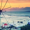windmill on the island of mykanos at sunset