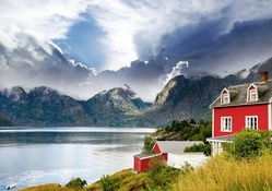 marvelous red house on a norway fjord