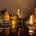 water like glass in a canal in bruges belgium