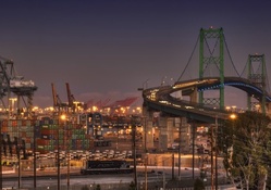 beautiful bridge by a busy port