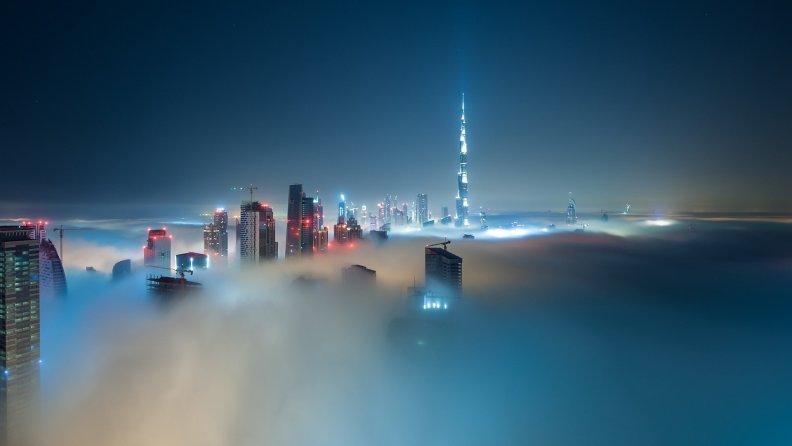 spectacular dubai skyscape in fog hdr