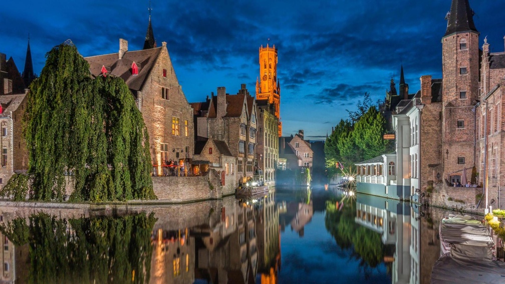 tranquil canal in bruges belgium in evening