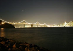 San Francisco Bay Bridge lit up at night