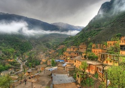 a city on a mountainside in iran hdr
