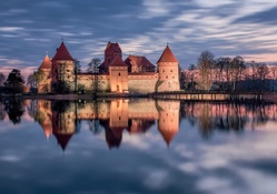trakai castle in lithuania reflected in lake