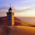 shifting sands around rubjerg knude lighthouse in denmark