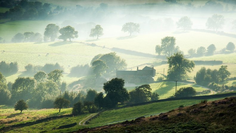 morning fog over a lovely farm