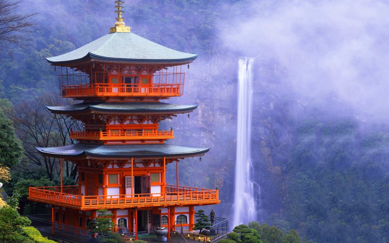 waterfall_behind_asian_temple.jpg