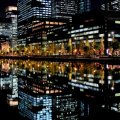 tokyo reflected in waterfront at night