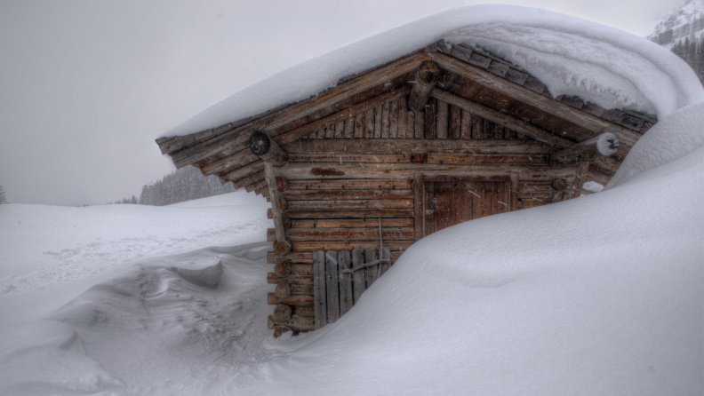 snowbound_log_cabin_in_the_mountains_hdr.jpg