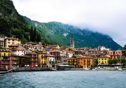 beautiful italian lake town on a foggy morning