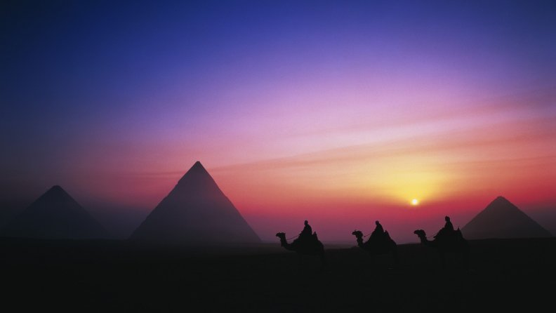 sunrise on the great pyramids of giza