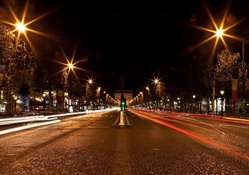 avenue late at night in the center of paris