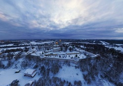 view of church within a fortress in winter