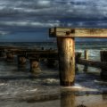 old broken dock on a beach hdr