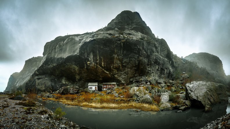 huts inside a mountain cavern