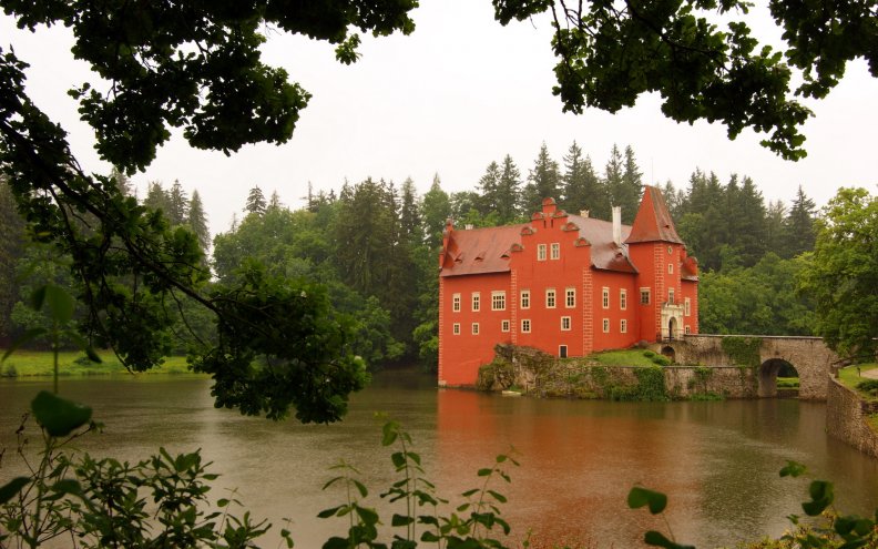lovely red castle on a lake