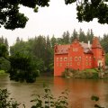lovely red castle on a lake